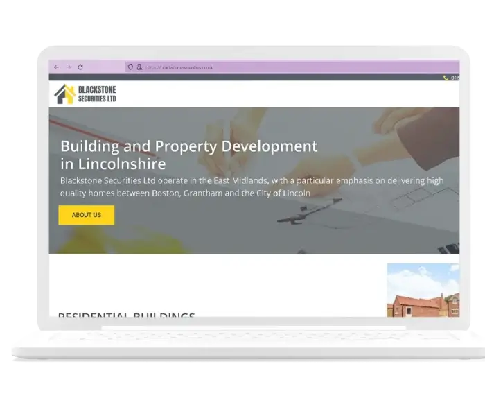 laptop showing property developer website design